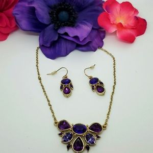 Avon purple and gold set